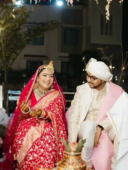 The happiness of a wedding day is infectious. Here, the bride and groom share a laugh during their ceremony.