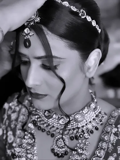 A timeless and regal black and white shot of my bride in Igatpuri. This captures the emotion and the intricate details of her jewellery and hair styling.