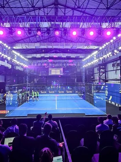 The audience watches the action at the World Padel League. We transformed the Nesco Exhibition Center into a professional padel arena, managing production, technicals, and infrastructure.