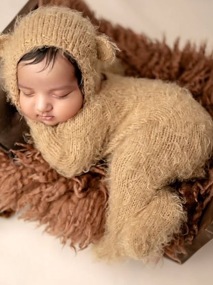 Another pose for our sweet bear cub. I always try to capture multiple angles to provide a full gallery of beautiful memories.