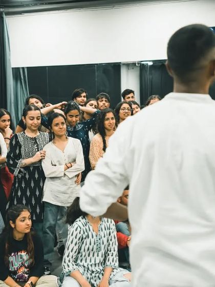 The students listening intently. A teacher is only as good as his students' willingness to learn.