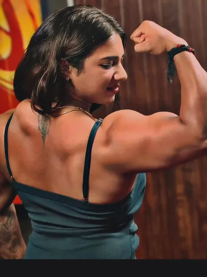 This is a testament to the grind. A close-up look at the muscle definition in my back and biceps, built through countless hours of focused training and proper nutrition. This is the result we will work towards.