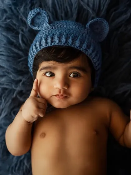 Adding a little bear hat for a touch of whimsy and fun.