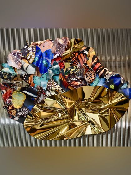 The full view of "Ephemeral Reflections," a wall installation that speaks to the fleeting beauty of nature.