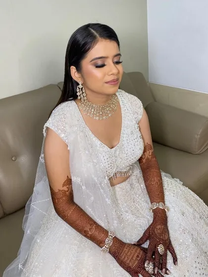 A close-up of Twinkle's smokey eye look. The makeup is blended to perfection, creating a look that is both glamorous and sophisticated.
