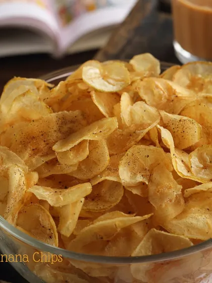 You can't have just one of our homemade Banana Chips. They are thinly sliced, perfectly crisp, and lightly seasoned, making them our all-time bestseller and the perfect companion for your evening chai.