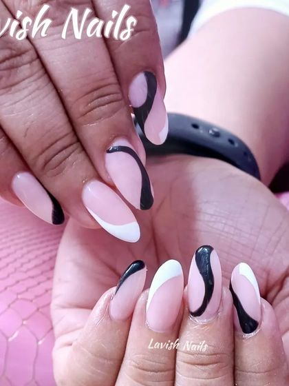 A minimalist abstract design with black and white swirls on a sheer pink base, creating a modern look.