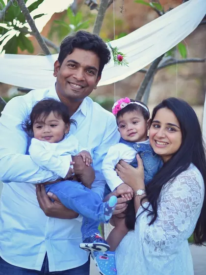 I also offer outdoor family photo sessions for a more natural and candid feel. Here, I captured a lovely family with their twin babies in a beautiful outdoor setting. These sessions are great for capturing genuine smiles and playful moments.