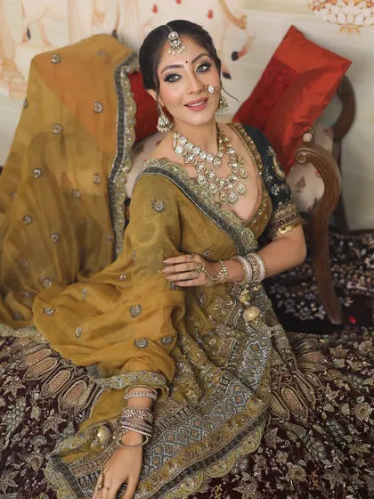 A happy and smiling bride, looking absolutely radiant on her special day.