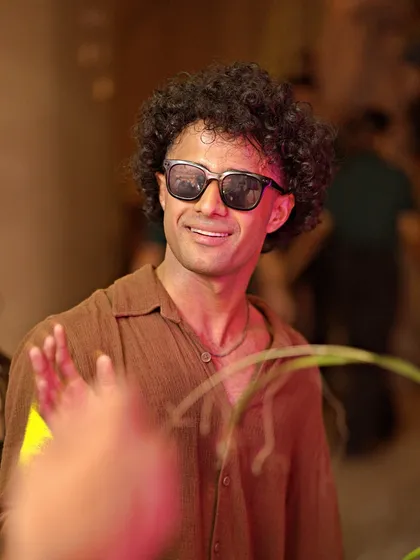 A stylish guest enjoying the vibe at our JU:CY Wednesday rooftop party. The crowd always comes with great energy.