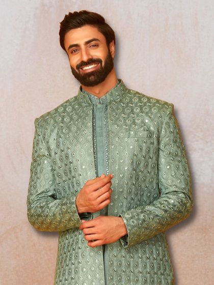 This sage green sherwani with mirror work is perfect for a brother of the groom or a wedding guest. It's festive, stylish, and budget-friendly to rent.