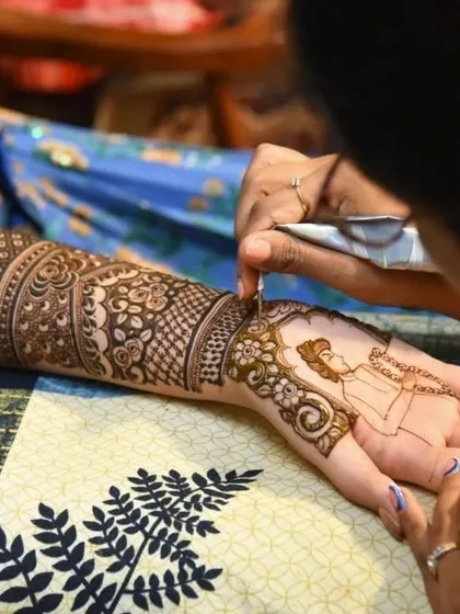 This is where the magic happens. A little glimpse of me in my element, carefully drawing a bride's story. Every single line is drawn with love and devotion.