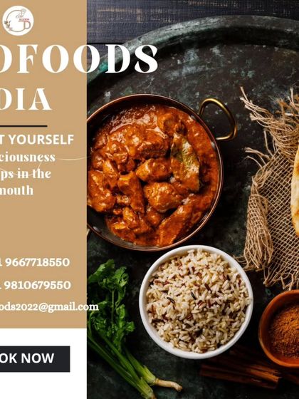 A close-up of a rich and aromatic chicken curry, served in a traditional copper bowl alongside rice and naan. We pride ourselves on authentic flavors that taste just like home.