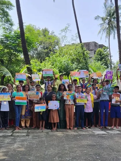 A group photo with all the participants and winners of the art competition. It was a day filled with creativity and community spirit.