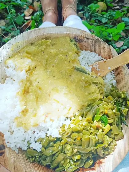 A simple, nourishing meal of rice, vegetables, and legumes served on a leaf plate at the Isha Yoga Center. Eating in this way, close to nature, makes you more sensitive to the food you consume and how it affects your system. It is a practice in mindfulness itself.