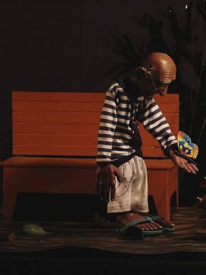 A quiet moment on stage from the 'Popo' show. The simple set design helps focus all the attention on the puppet's emotional journey.