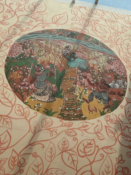 The "Mullai" (Forest) panel installed on the wall. This painting is a meditation on rest as a form of resistance for women, showing figures relaxing and enjoying music in a lush, pastoral landscape.