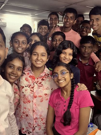 Another happy group of students celebrating the Navratri color theme. These simple activities create a lively and inclusive atmosphere in our classes.