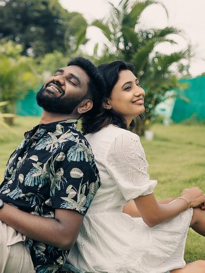 The couple shares a laugh, perfectly capturing the fun and easygoing nature of a post-wedding shoot.