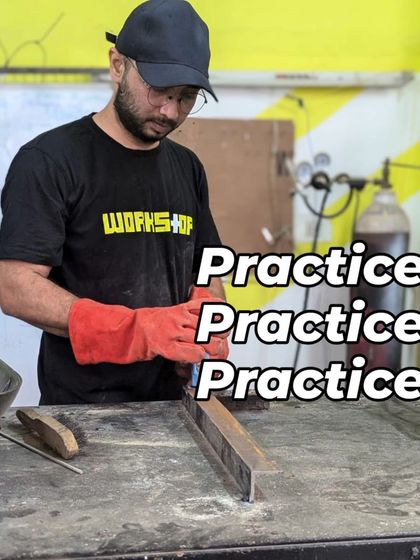 Practice makes perfect. An instructor demonstrates how to clean and prepare a metal surface after welding, a crucial step for achieving a polished final product.