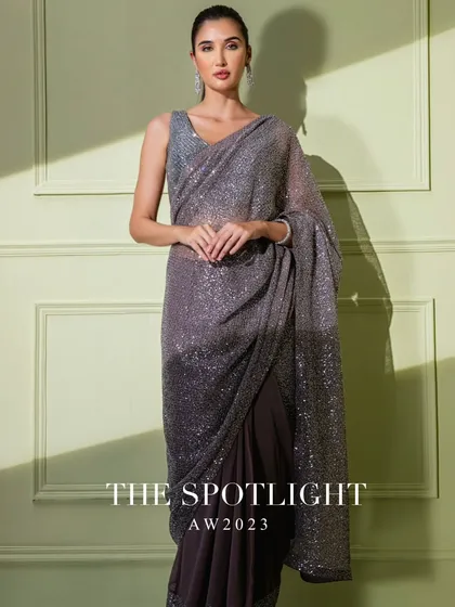 A campaign shot of the grey ombre sequin saree, capturing its sophisticated sparkle.