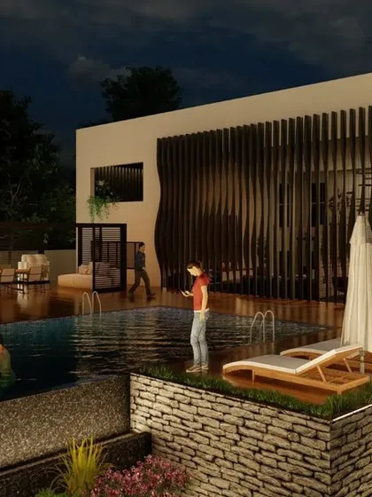 A closer look at the pool area at night. We use strategic lighting to create a magical ambiance, highlighting the pool, deck, and surrounding landscape, making it a perfect spot for evening relaxation or poolside parties.