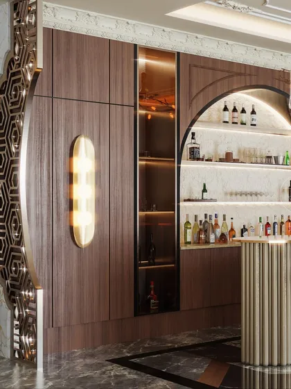 This angle showcases the decorative metal screen and the arched bar niche, adding layers of craftsmanship to the design.