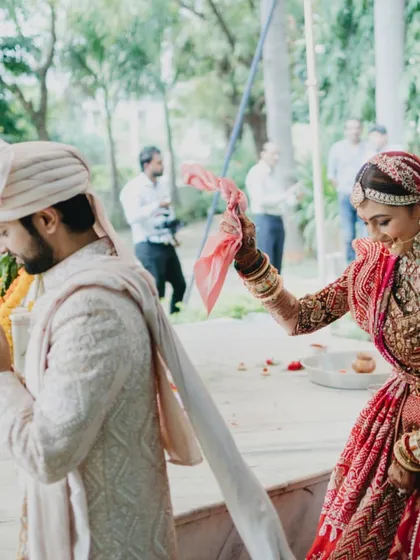 The tying of the 'gathbandhan', symbolizing the joining of two souls.