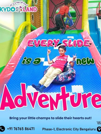 Every slide is a new adventure waiting to happen. Here, a young champ enjoys a fun ride down our donut slide, one of the many exciting attractions in our play area.