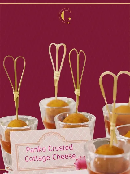 Panko Crusted Cottage Cheese bites served in shot glasses with a tangy dipping sauce. The combination of the crispy panko exterior and soft paneer interior is a textural delight.