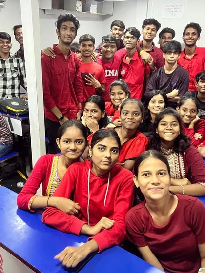 Our students dressed in red for Day 3 of Navratri 2023, filling the classroom with energy.