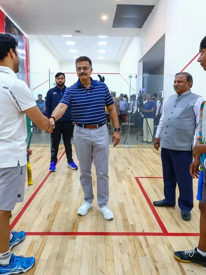 Shaking hands with IPS Alok Singh after a tournament win in Kanpur. I believe in sportsmanship and respect.