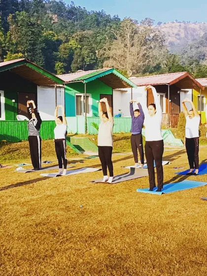 Morning stretches at our Rishikesh yoga retreat. We start our day by saluting the sun and soaking in the peaceful energy of the Himalayas.