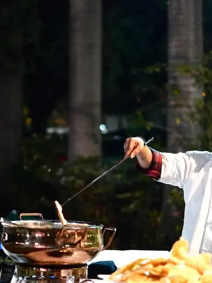 Our chefs are the stars of the show, even at smaller parties. This image captures our chef at a live counter during a birthday celebration, adding a touch of culinary theater to the event.