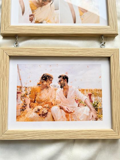 Preserve the joyous occasion of Haldi with our beautiful photo frames. This hanging frame is perfect for displaying a series of moments from the special day.