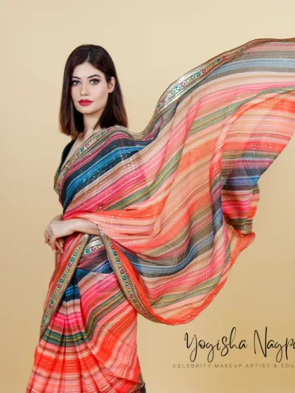 Draped in elegance for a saree shoot. The flowing fabric and beautiful makeup create a picture of grace and tradition.