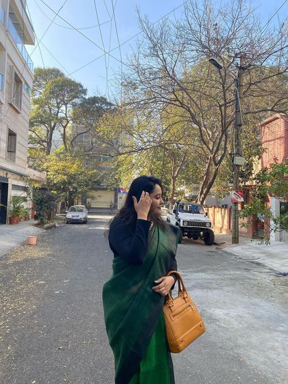 A candid moment captured while wearing one of my favorite professional sarees. Your style should feel natural and allow you to move through your day with ease and confidence.