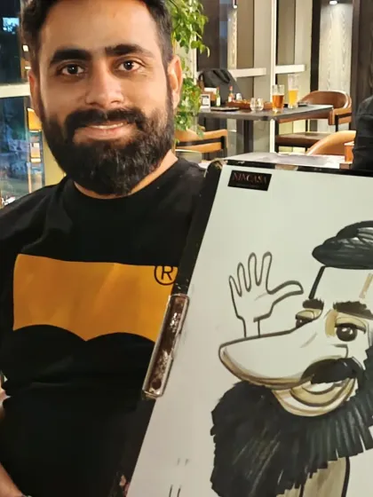This guest's friendly wave was a fun addition to his caricature. I love adding small gestures that show personality.