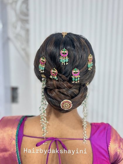 Another angle of the intricate updo with temple jewellery, showing the beautiful craftsmanship.