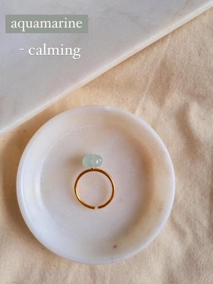 Another view of the Aquamarine Melon Ring, perfect for those who love unique cuts and calming vibes.