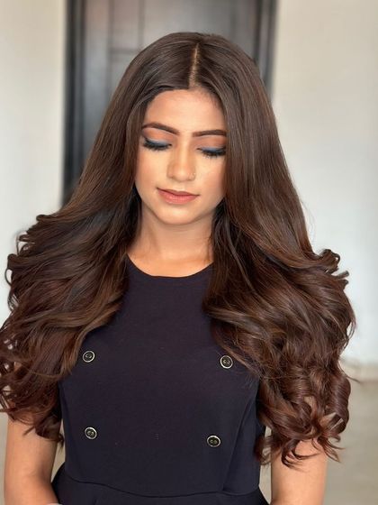 A chic open look with tons of volume and bounce. I used my hair extensions to achieve this full and luxurious hairstyle.