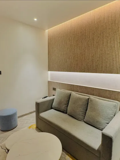 We also check for extra comforts like a sofa or seating area within the hotel rooms, ensuring there is ample space for guests to relax.