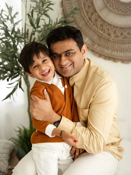 The special bond between a father and his son, captured in a moment of pure joy. Sibling and parent combinations are a wonderful part of any family photoshoot.
