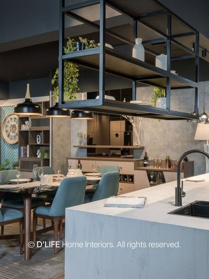 A wide view of an open-concept living space, showing how the kitchen, dining, and living areas flow together, unified by a consistent color palette and material choice.