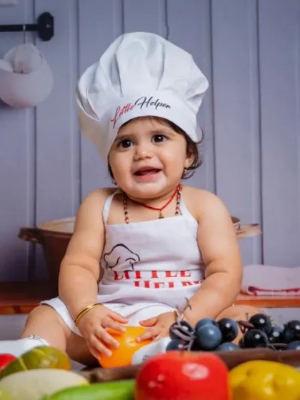 Sweetness overload with fruit and a whole lot of love. This little chef is ready to cook up a storm.