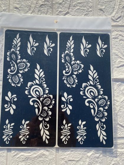 This large stencil features a beautiful paisley and floral design, perfect for creating a classic Arabic mehndi look.
