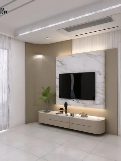 A minimalist TV unit design for a bedroom, featuring a floating console and a marble accent wall. The sheer curtains allow for soft, diffused natural light.
