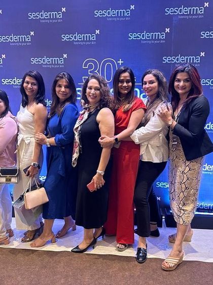 A group photo with my fellow dermatologists at a professional event. The sense of community and shared passion for skincare is truly inspiring.
