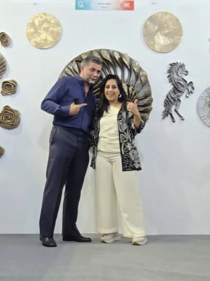 So much fun and energy at the Qatar exhibition. Sharing a moment with a new friend and admirer of my work.