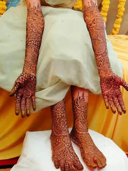 The beautiful result of my organic henna after the paste has come off. This bride is ready for her ceremony with a deep, rich stain on her hands and feet.